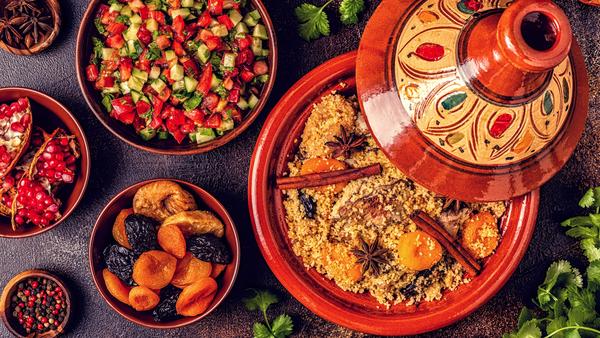 A fusion of cultural influences — Amazigh, Arab, Jewish, and French — dig into Morocco’s diverse cuisine including its beloved staple