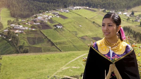 woman in her local farm fields, Ecuador