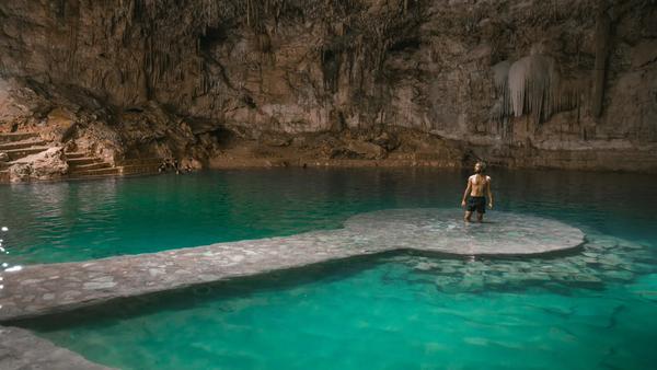 Explore Mexico’s Yucatan Peninsula webbed with rivers flowing underneath your feet to create epic caves and swimming holes