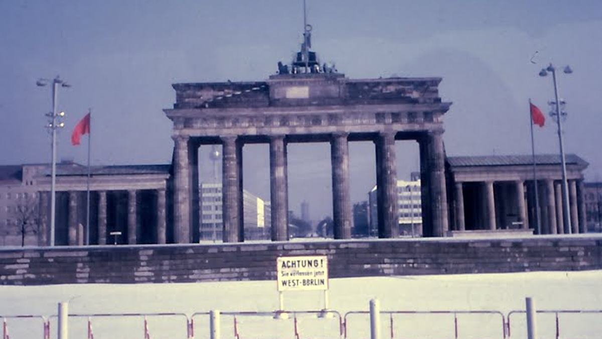 The Berlin Wall goes around Brandenburg Gate, looking in from West Berlin. Taken by the author’s father during a visit to Berlin in 1969.