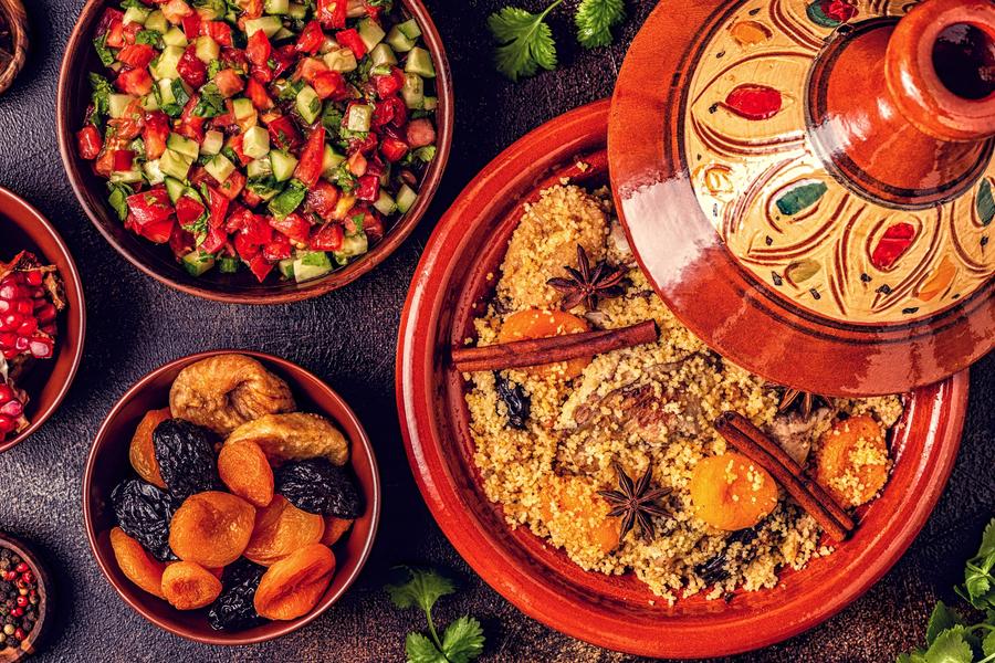 A fusion of cultural influences — Amazigh, Arab, Jewish, and French — dig into Morocco’s diverse cuisine including its beloved staple