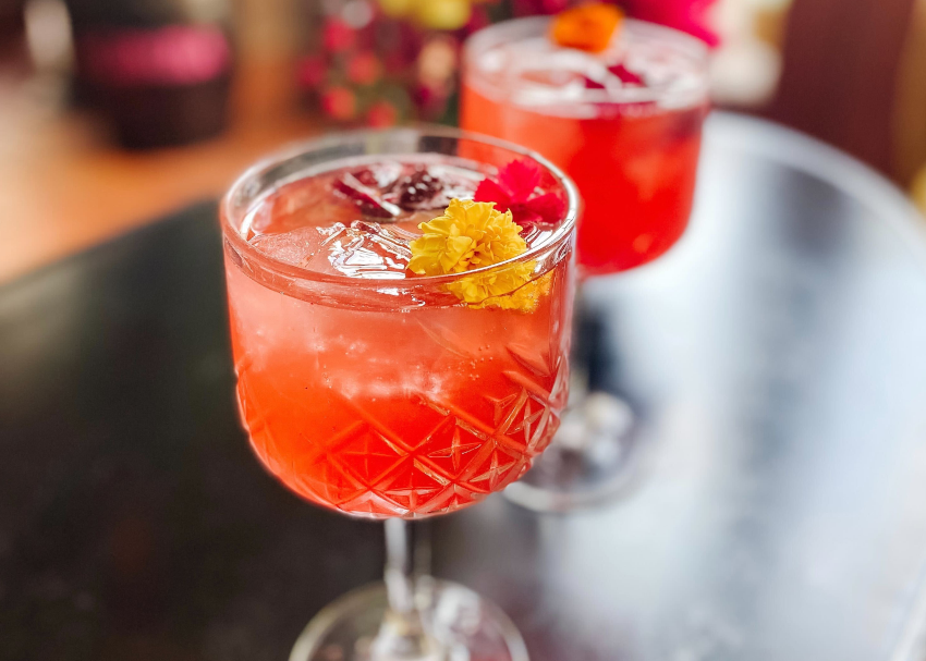 Close up look at an icy blood orange coloured cava cocktail made famous in Spain