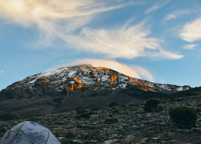 looking up from the G Adventures camp site at the summit during sunrise on Mt Kilimanjaro